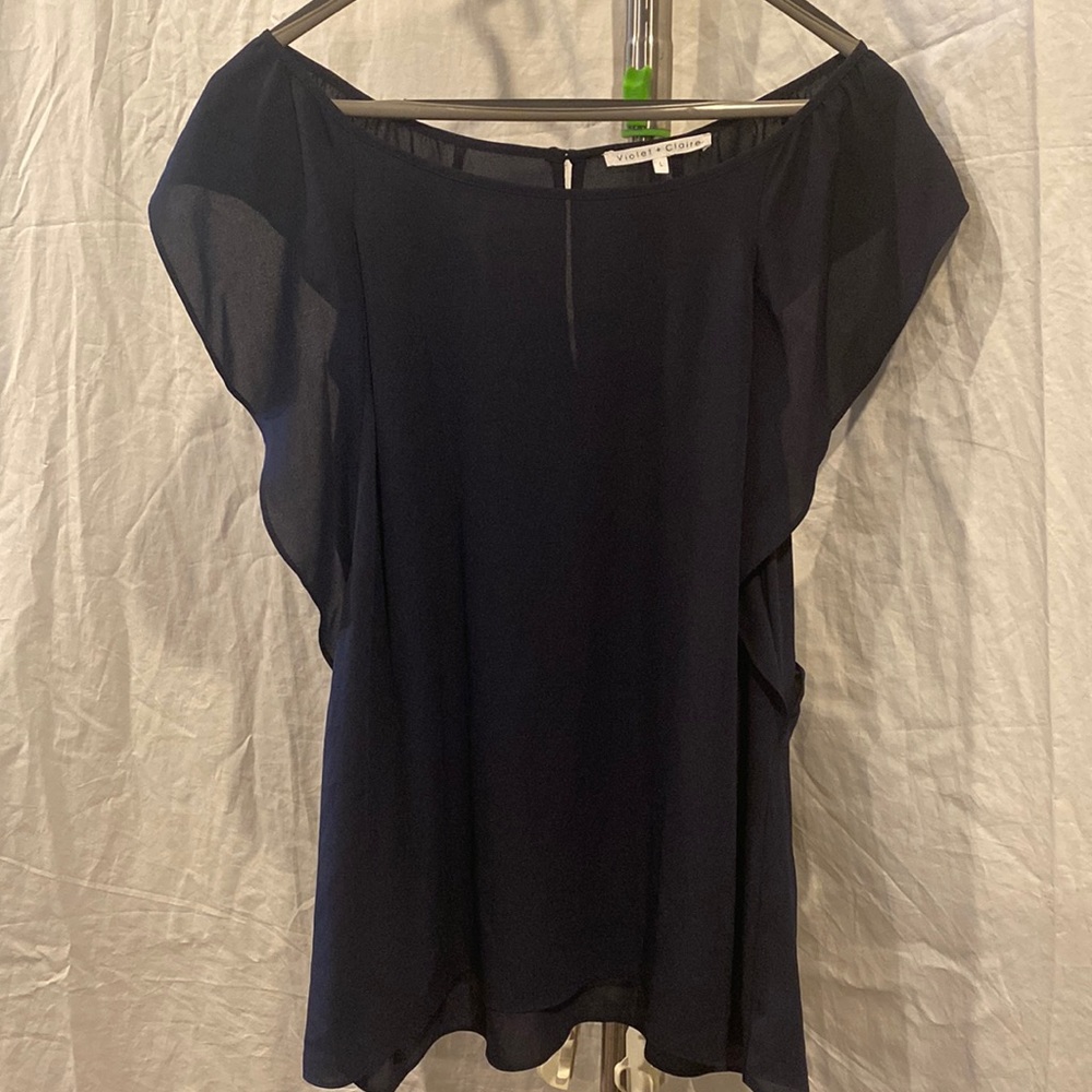 Women light top.  Large.  Violet and Claire